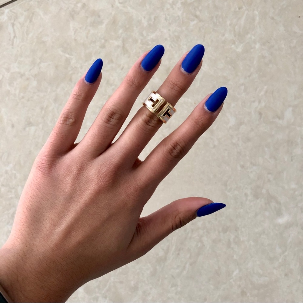 T & Co. gold and white ceramic ring size 5